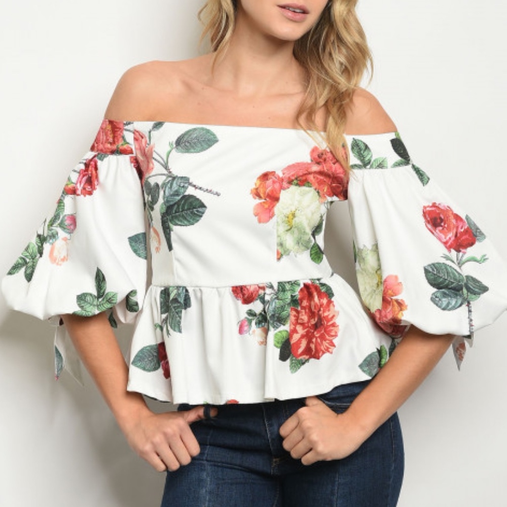 GIRLY & FLIRTY off the shoulder floral blouse.